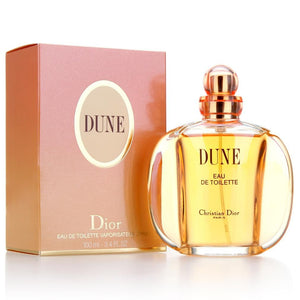 Christian Dior Dune Eau de Toilette 100ml women's perfume rounded golden bottle beside its peach box